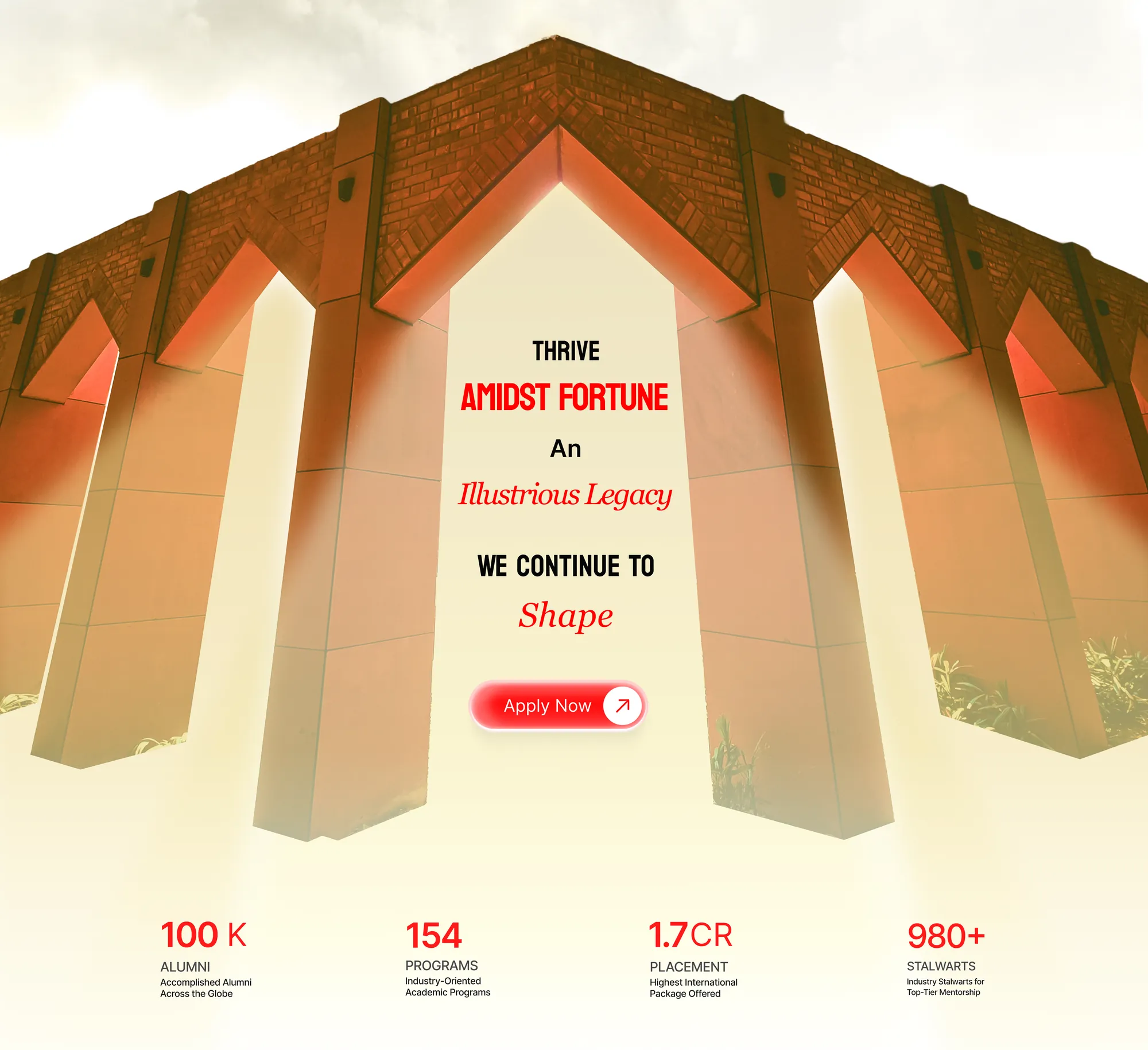 An unused section: “Thrive amidst fortune” framed by the campus arches in warm light, with the four headline numbers under it