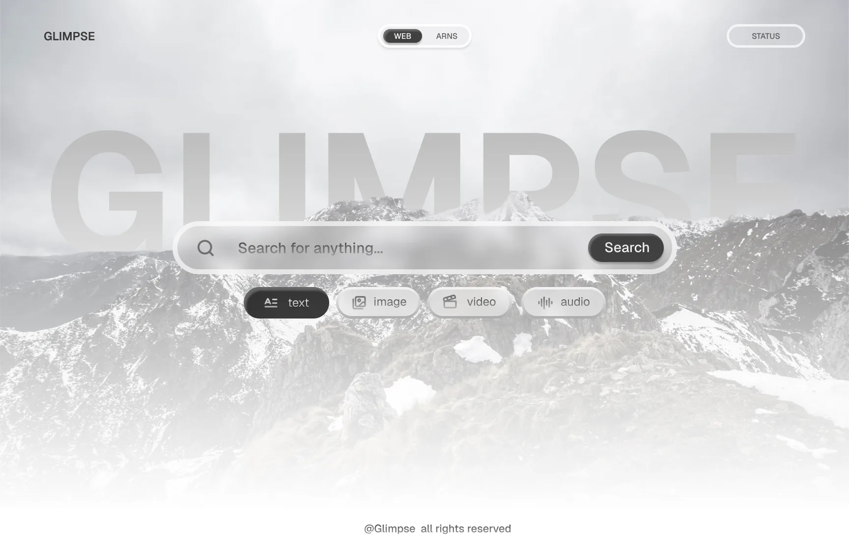 The glass direction, light: the same frosted search over a pale, misty mountain range